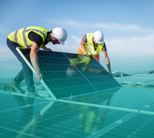 2 men installing solar panels using Managed SASE for Utilities